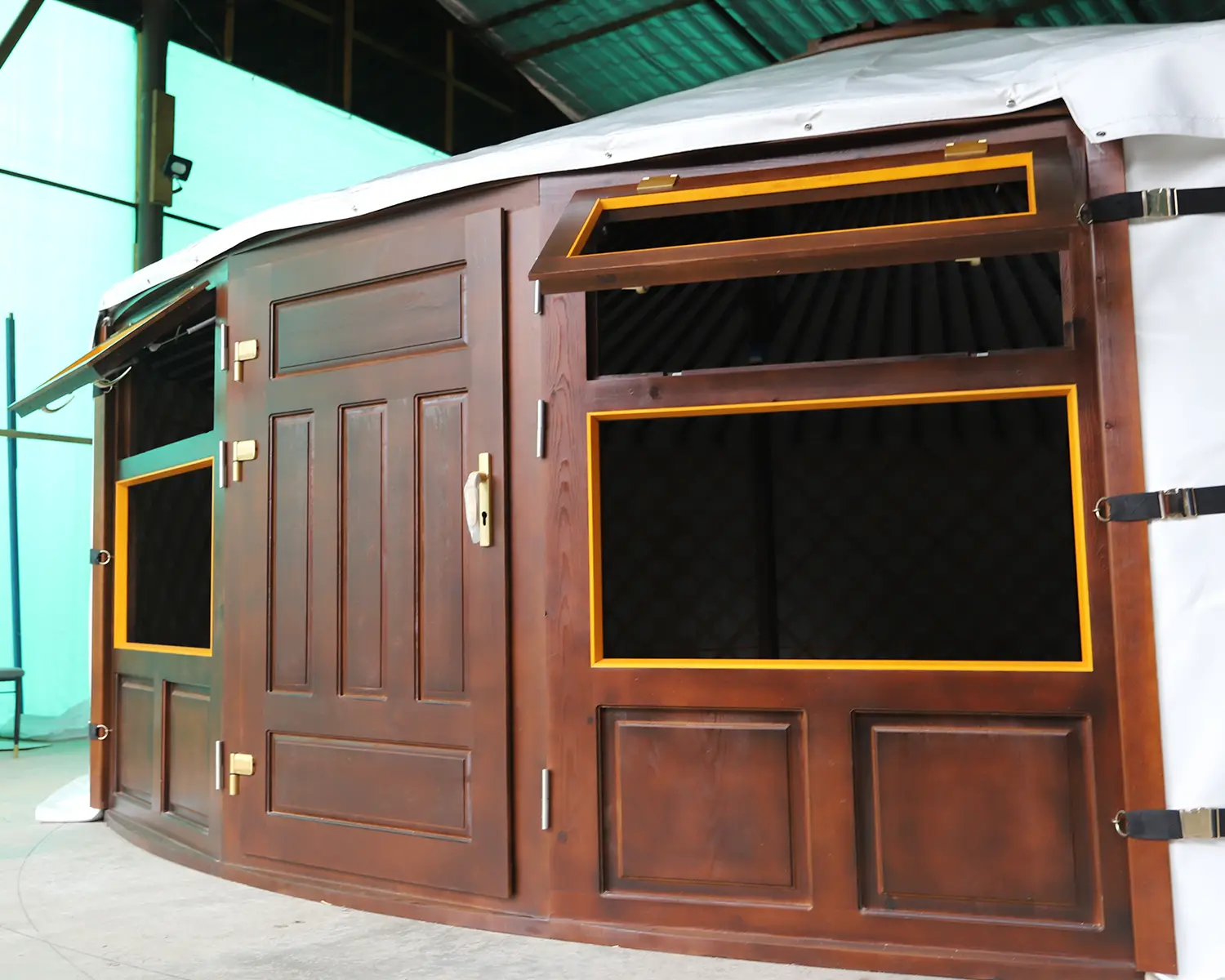 a Mongolian yurt from outside painted in brown color in white cover