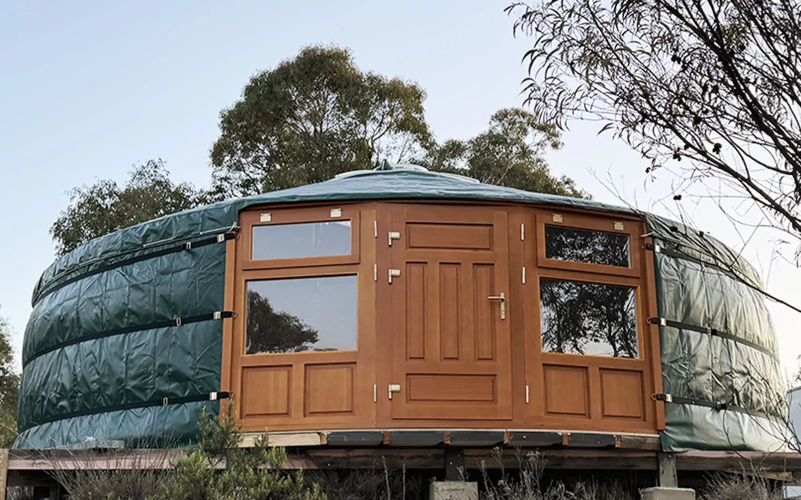 Green outer cover put on roof of a Mongolian yurt