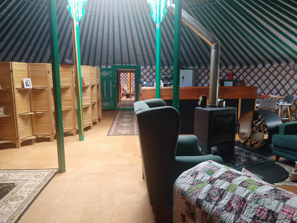 A stove placed in the center of a 11mm yurt