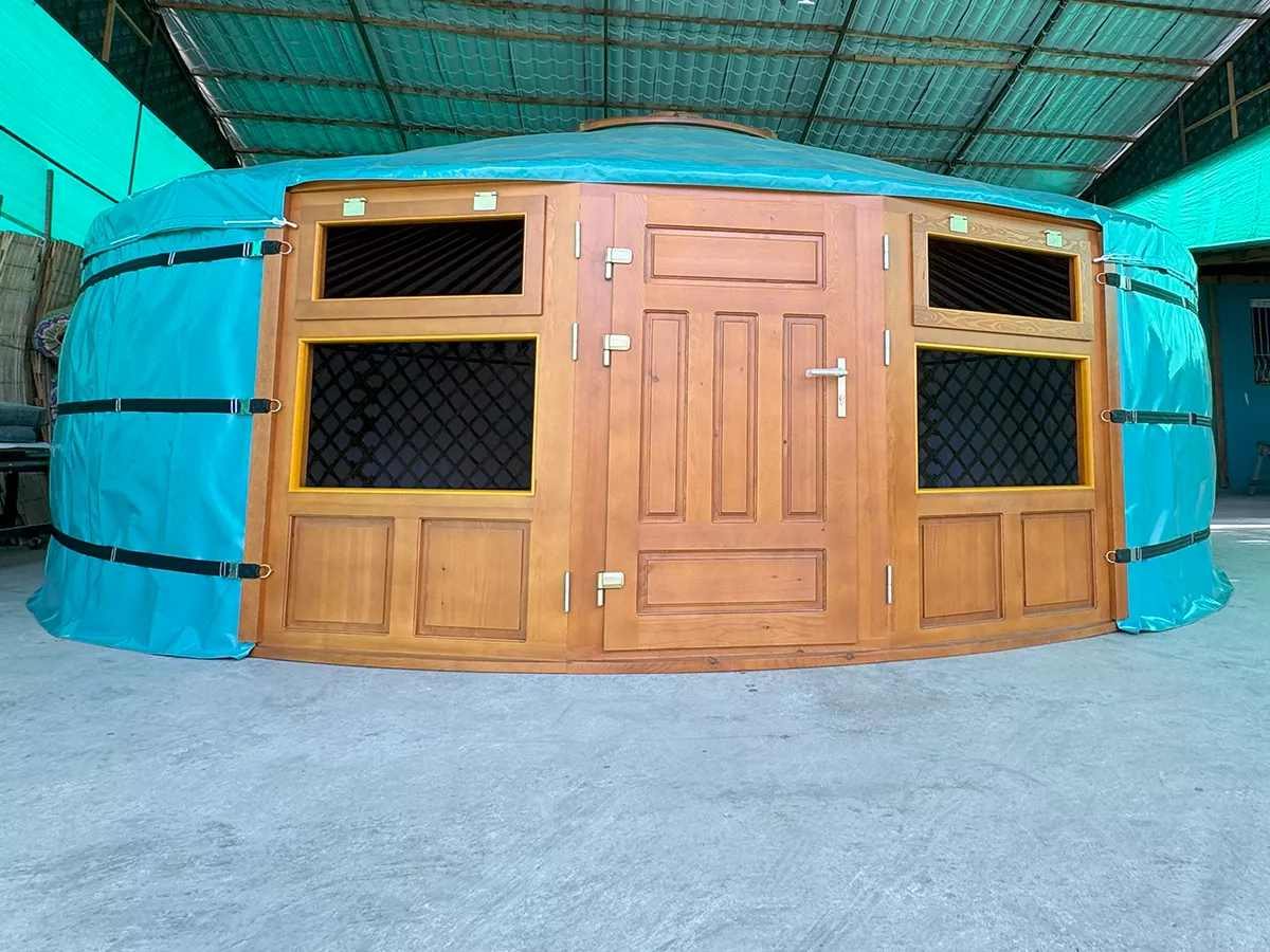 A yurt with water based exterior paint, in teak color
