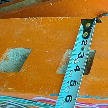 Tape measuring thickness of a low-quality Mongolian Yurt